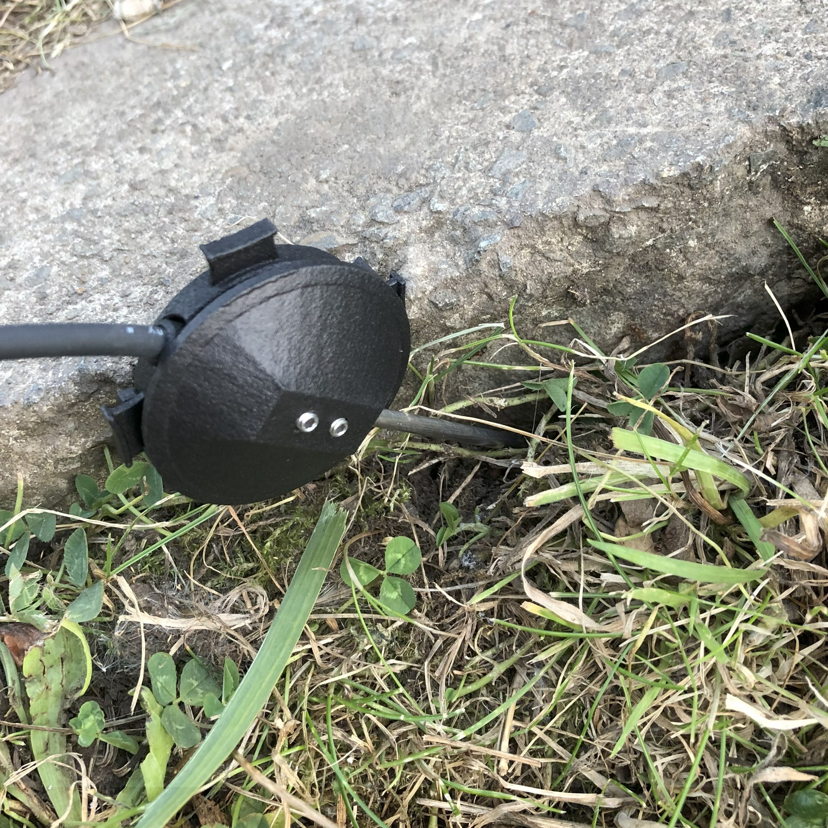 A contact mic stuck into the mud.